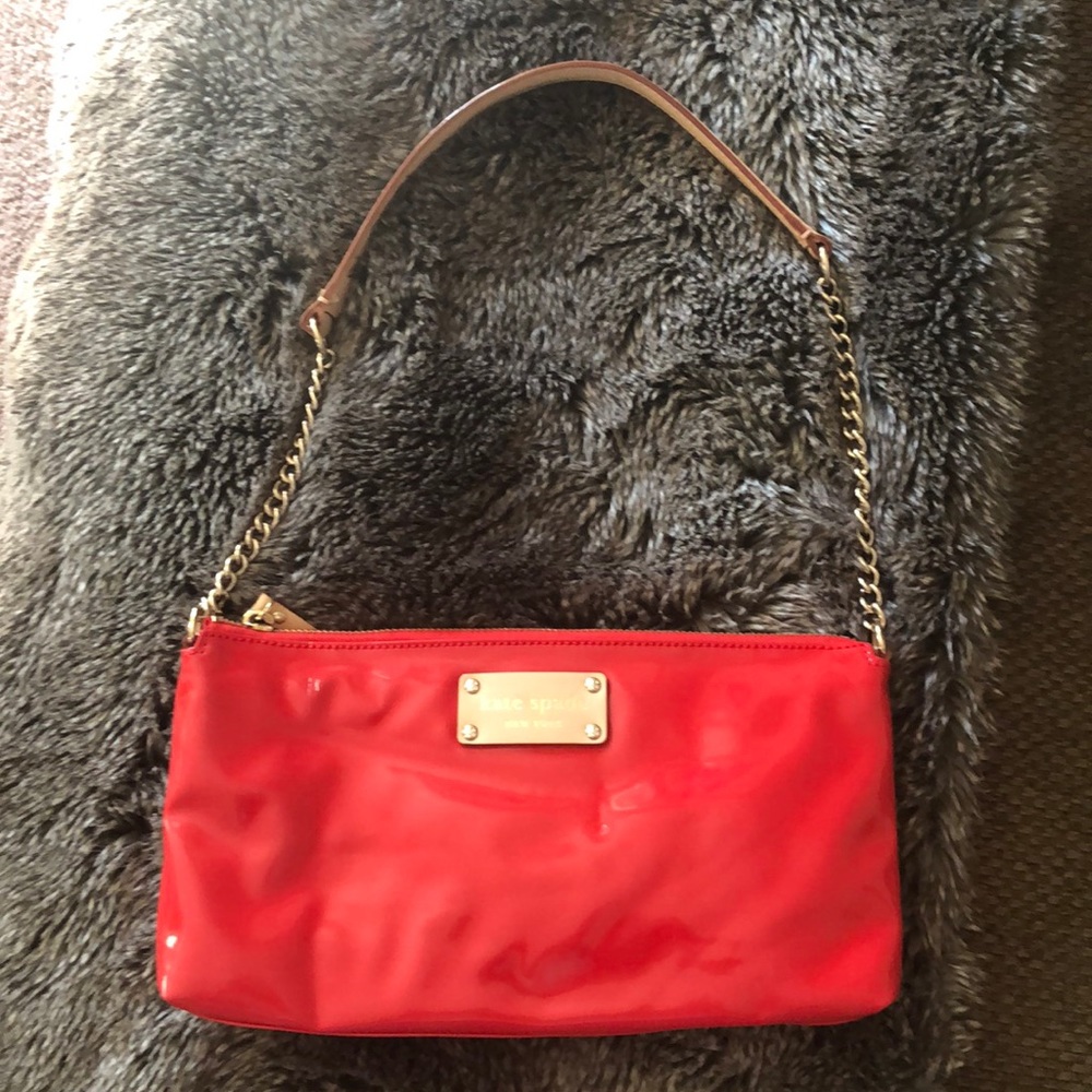 Kate Spade New York Red Patent Leather clutch.